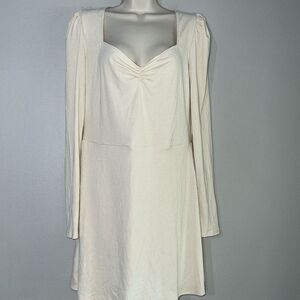 Francesca’s cream and tan ribbed mini dress with long sleeves
